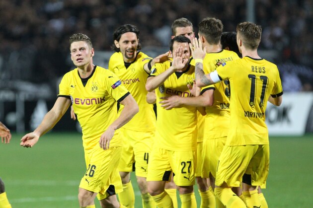 Dortmund's players celebrate after scoringduring the UEFA Europa League group C football match between PAOK FC and Borussia Dortmund at the Stadio Toumba in Thessaloniki on October 1, 2015. The match in a 1-1 draw. AFP PHOTO / SAKIS MITROLIDIS        (Photo credit should read SAKIS MITROLIDIS/AFP/Getty Images)