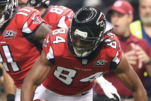 Atlanta Falcons wide receiver Roddy White (84) celebrates his touchdown against the New Orleans Saints with Atlanta Falcons wide receiver Julio Jones (11) during the first half of an NFL football game, Thursday, Oct. 15, 2015, in New Orleans. (AP Photo/John Bazemore)