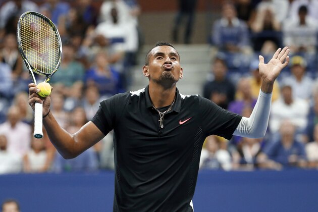 Nick Kyrgios, of Australia, reacts between points against Andy Murray, of Britain, during the first round of the U.S. Open tennis tournament in New York, Tuesday, Sept. 1, 2015. (AP Photo/Julio Cortez)