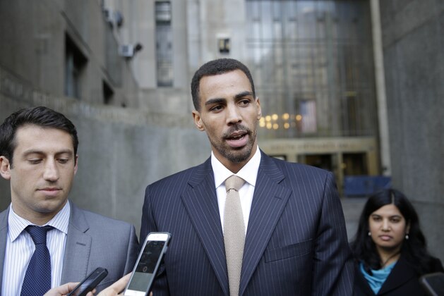 Thabo Sefolosha talks to reporters outside criminal court in New York, Friday, Oct. 9, 2015. The Atlanta Hawks' player was acquitted Friday in a case stemming from a police fracas outside a trendy New York City nightclub. (AP Photo/Seth Wenig)