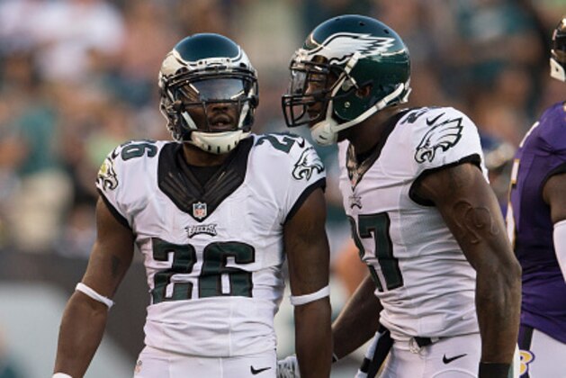 PHILADELPHIA, PA - AUGUST 22: Walter Thurmond #26 and Malcolm Jenkins #27 of the Philadelphia Eagles react after an interception in the game against the Baltimore Ravens on August 22, 2015 at Lincoln Financial Field in Philadelphia, Pennsylvania.  (Photo by Mitchell Leff/Getty Images)