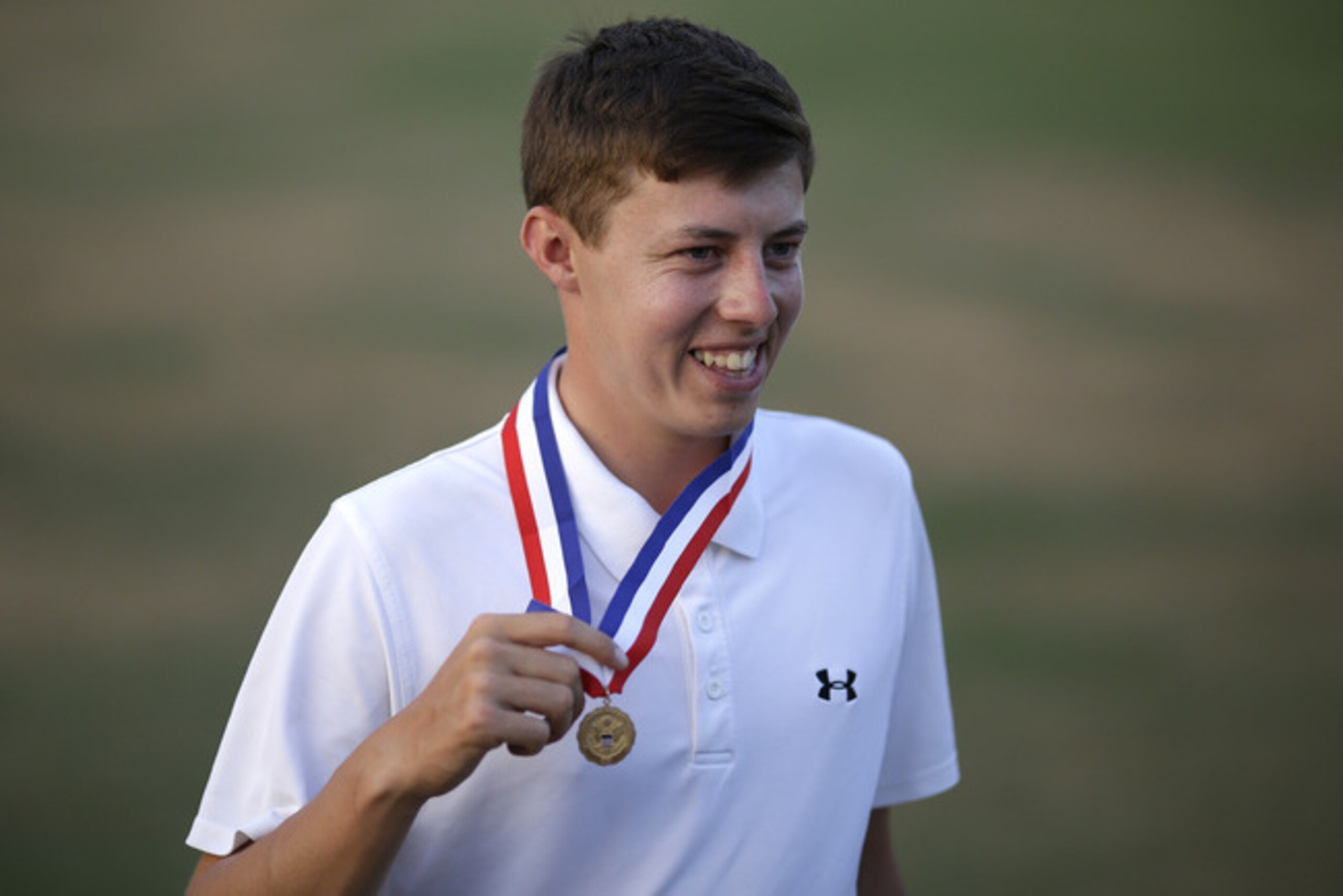 Amateur, Matthew Fitzpatrick, England, poses with the low amateur medal after the U.S. Open golf tournament in Pinehurst, N.C., Sunday, June 15, 2014. Martin Kaymer, of Germany, won. (AP Photo/David Goldman) Amateur, Matthew Fitzpatrick, England, poses with the low amateur medal after the U.S. Open golf tournament in Pinehurst, N.C., Sunday, June 15, 2014. Martin Kaymer, of Germany, won. (AP Photo/David Goldman)