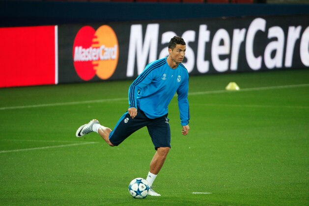 Real Madrid's Cristiano Ronaldo controls a ball during a training session, at the Parc des Princes stadium, in Paris, France, Tuesday, Oct. 20, 2015. Real Madrid will face Paris Saint-Germain in a Champions League soccer match on Wednesday. (AP Photo/Thibault Camus)
