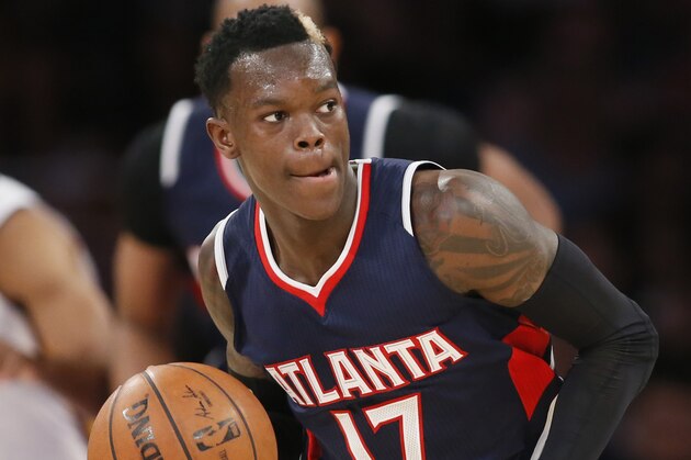 Atlanta Hawks' Dennis Schroder dribbles against the Los Angeles Lakers during the first half of an NBA Basketball game, Sunday, March 15, 2015, in Los Angeles. (AP Photo/Danny Moloshok)