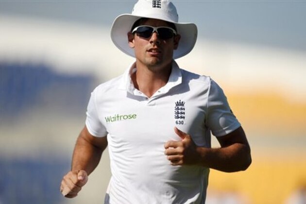 England's captain Alastair Cook runs during the final day of first test match between Pakistan and England at Zayed Cricket Stadium in Abu Dhabi, United Arab Emirates, Saturday, Oct.17, 2015. (AP Photo/Hafsal Ahmed)
