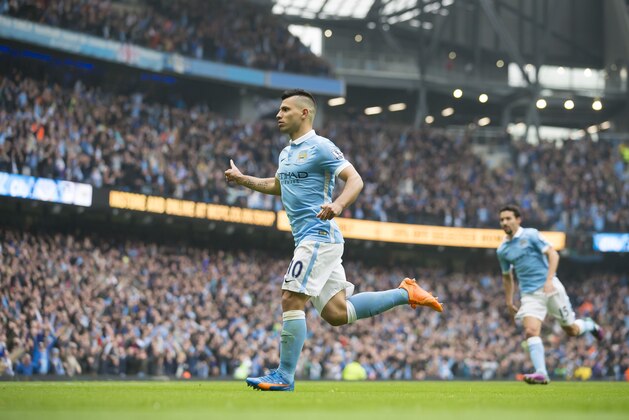 Manchester City's Sergio Aguero celebrates after scoring his third goal during the English Premier League soccer match between Manchester City and Newcastle at the Etihad Stadium, Manchester, England, Saturday Oct. 3, 2015. (AP Photo/Jon Super)