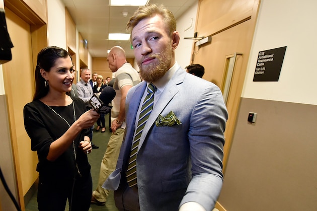 DUBLIN, IRELAND - MARCH 31:  Conor 'The Notorious' McGregor of Ireland is interviewed by UFC host Megan Olivi during the UFC 189 World Championship Fan Event on March 31, 2015 in Dublin, Ireland. (Photo by Jeff Bottari/Zuffa LLC/Zuffa LLC via Getty Images)