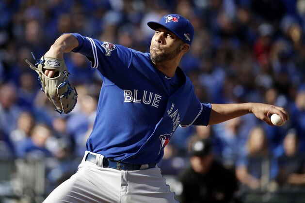 Toronto Blue Jays starting pitcher David Price throws against the Kansas City Royals during the first inning in Game 2 of baseball's American League Championship Series on Saturday, Oct. 17, 2015, in Kansas City, Mo. (AP Photo/Charlie Riedel)