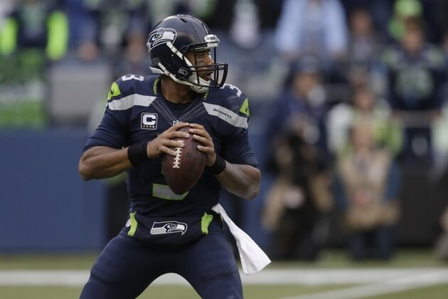 Seattle Seahawks quarterback Russell Wilson drops back to pass during the second half of an NFL football game, Sunday, Oct. 18, 2015, in Seattle. The Panthers beat the Seahawks 27-23. (AP Photo/Stephen Brashear)