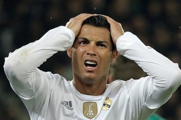 Real Madrid's Cristiano Ronaldo reacts after missing a goal during the Champions League group A soccer match between Paris St Germain and Real Madrid at the Parc des Princes stadium in Paris, Wednesday, Oct. 21, 2015. (AP Photo/Thibault Camus)