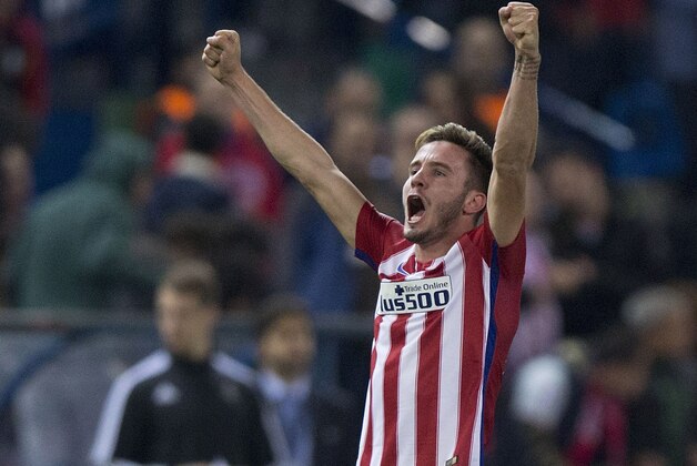 MADRID, SPAIN - OCTOBER 21:  Saul Niguez (2ndR) celebrates scoring their opening goal during the UEFA Champions League Group C match between Club Atletico de Madrid and FC Astana at Vicente Calderon stadium on October 21, 2015 in Madrid, Spain.  (Photo by Gonzalo Arroyo Moreno/Getty Images)