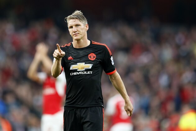 Manchester United's Bastian Schweinsteiger applauds his teams fans  following the end of the English Premier League soccer match between Arsenal and Manchester United at Emirates stadium in London, Sunday, Oct. 4, 2015. Arsenal won the game 3-0. (AP Photo/Frank Augstein)