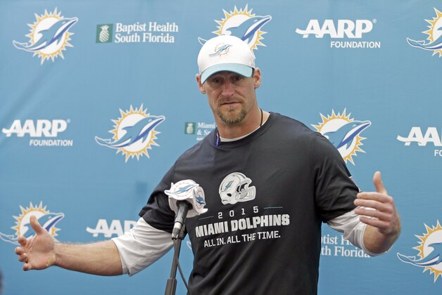 Miami Dolphins head coach Dan Campbell talks to reporters after an NFL football practice, Thursday, Oct. 15, 2015, in Davie, Fla. (AP Photo/Alan Diaz)