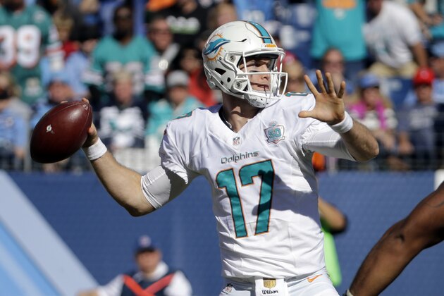 Miami Dolphins quarterback Ryan Tannehill passes against the Tennessee Titans in the second half of an NFL football game Sunday, Oct. 18, 2015, in Nashville, Tenn. (AP Photo/James Kenney)
