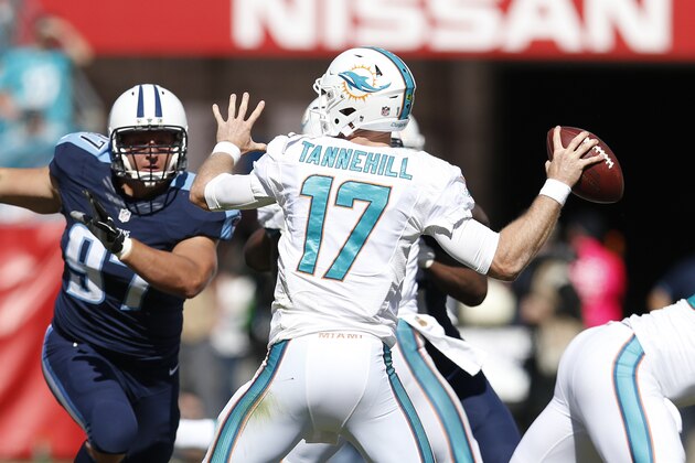 Tennessee Titans defensive end Karl Klug (97) rushes against Miami Dolphins quarterback Ryan Tannehill (17) in the first half of an NFL football game Sunday, Oct. 18, 2015, in Nashville, Tenn. (AP Photo/Weston Kenney)