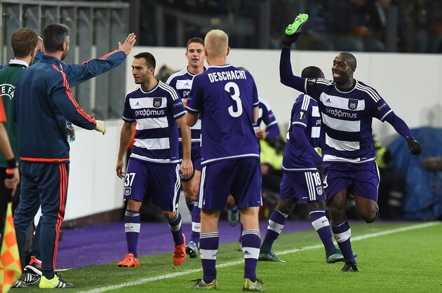 Anderlecht's Stefano Okaka (R) celebrates after scoring  during the UEFA Europa League Group J football match between RSC Anderlecht and Tottenham Hotspur FC at the Constant Vanden Stock Stadium in Brussels, on October 22, 2015. AFP PHOTO / EMMANUEL DUNAND        (Photo credit should read EMMANUEL DUNAND/AFP/Getty Images)