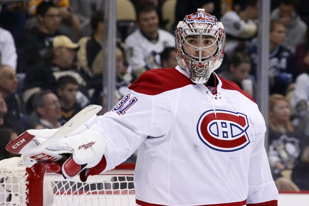 Montreal Canadiens goalie Carey Price (31) plays during an NHL hockey game against the Pittsburgh Penguins in Pittsburgh Tuesday, Oct. 13, 2015.(AP Photo/Gene J. Puskar