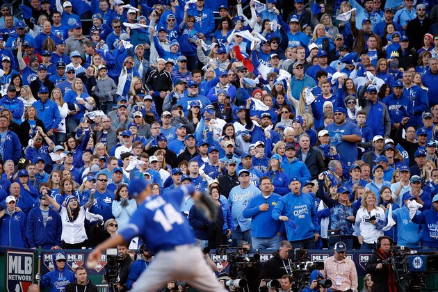 KANSAS CITY, MO - OCTOBER 17:  Fans cheer as David Price #14 of the Toronto Blue Jays throws a pitch in the seventh inning against the Kansas City Royals during game two of the American League Championship Series at Kauffman Stadium on October 17, 2015 in Kansas City, Missouri.  (Photo by Rob Carr/Getty Images)