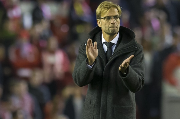 Liverpool's manager Juergen Klopp applauds after his team's 1-1 draw in the Europa League Group B soccer match between Liverpool and Rubin Kazan at Anfield Stadium, Liverpool, England, Thursday Oct. 22, 2015. (AP Photo/Jon Super)