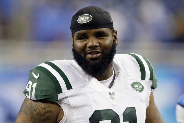 FILE - In this Aug. 13, 2015, file photo, New York Jets defensive end Sheldon Richardson walks off the field following an NFL preseason football game against the Detroit Lions in Detroit. A lapse in judgment cost Richardson the first four games of the season, the result of an NFL-issued suspension for violating the league's substance abuse policy.  (AP Photo/Duane Burleson, File)