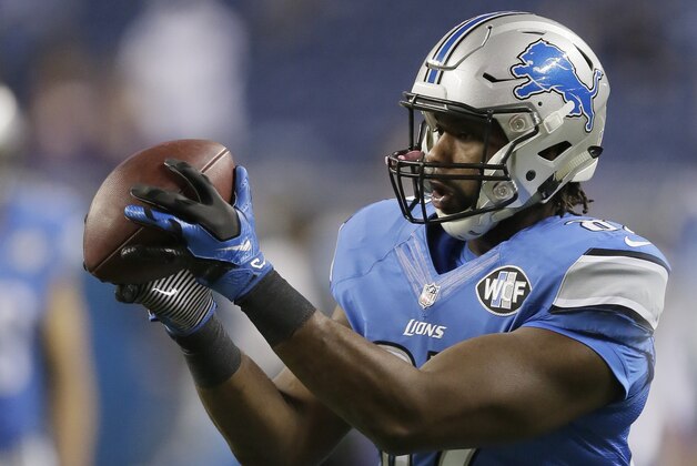 Detroit Lions tight end Brandon Pettigrew (87) makes a catch during pre-game warmups of an NFL football game against the Minnesota Vikings at Ford Field in Detroit, Sunday, Dec. 14, 2014. (AP Photo/Duane Burleson)