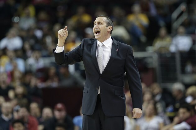 Cleveland Cavaliers head coach David Blatt yells to players in the second half of an NBA preseason basketball game against the Dallas Mavericks, Monday, Oct. 19, 2015, in Cleveland. (AP Photo/Tony Dejak)