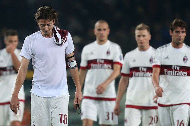 AC Milan's midfielder Riccardo Montolivo and teammates react at the end of the Italian Serie A football match Torino Vs AC Milan on October 17, 2015 at the 'Olympic Stadium' in Turin. AFP PHOTO / MARCO BERTORELLO (Photo credit should read MARCO BERTORELLO/AFP/Getty Images) AC Milan's midfielder Riccardo Montolivo and teammates react at the end of the Italian Serie A football match Torino Vs AC Milan on October 17, 2015 at the 'Olympic Stadium' in Turin. AFP PHOTO / MARCO BERTORELLO (Photo credit should read MARCO BERTORELLO/AFP/Getty Images)