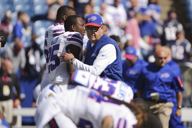 Buffalo Bills head coach Rex Ryan talks to running back LeSean McCoy (25) before an NFL football game Sunday, Sept. 20, 2015, in Orchard Park, N.Y. (AP Photo/Gary Wiepert)