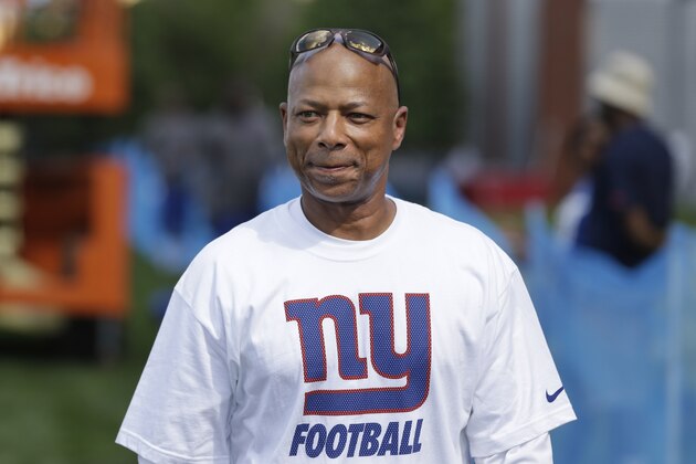 New York Giants general manager Jerry Reese walks on the sidelines during a practice at NFL football training camp in East Rutherford, N.J., Sunday, Aug. 2, 2015. (AP Photo/Seth Wenig)