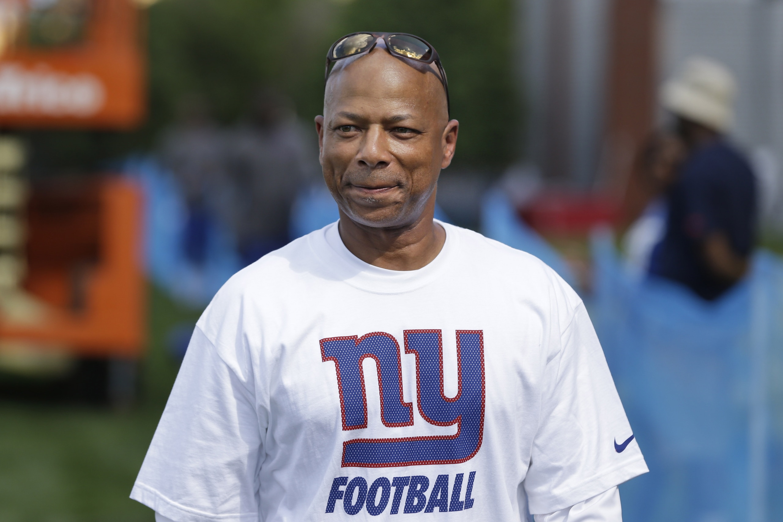 New York Giants general manager Jerry Reese walks on the sidelines during a practice at NFL football training camp in East Rutherford, N.J., Sunday, Aug. 2, 2015. (AP Photo/Seth Wenig)