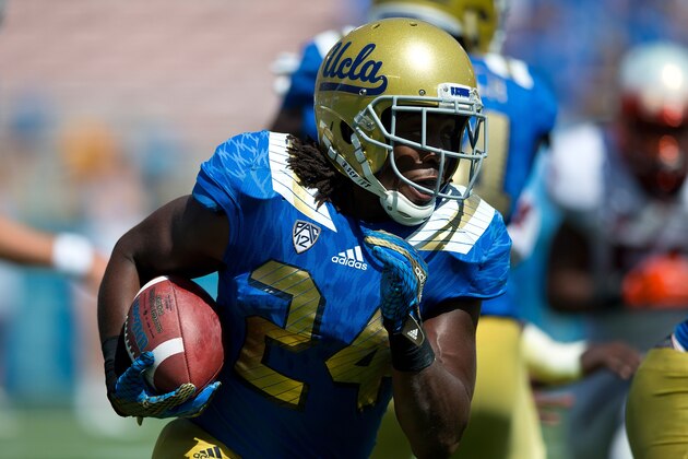 PASADENA, CA - SEPTEMBER 05:  Running back Paul Perkins #24 of the UCLA Bruins rushes up field against the Virginia Cavaliers during the third quarter at the Rose Bowl on September 5, 2015 in Pasadena, California.  The UCLA Bruins defeated the Virginia Cavaliers 34-16. (Photo by Jason O. Watson/Getty Images)