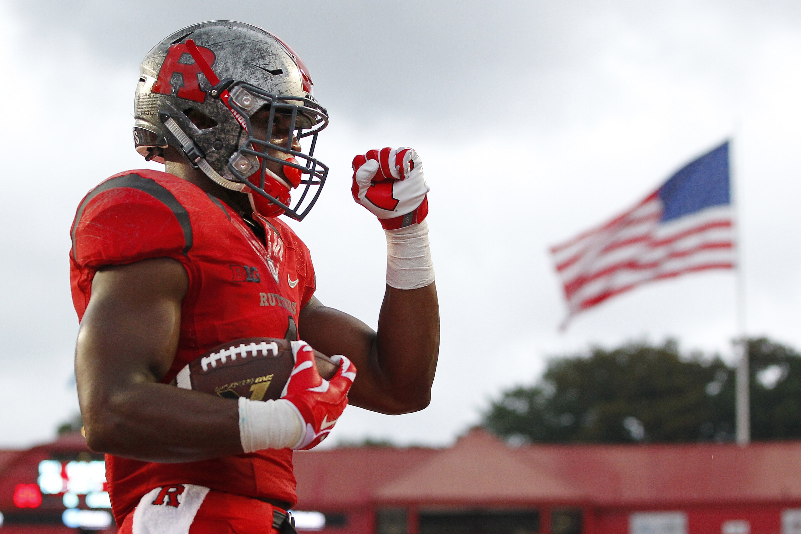 PISCATAWAY, NJ - SEPTEMBER 12: Leonte Carroo #4 of the Rutgers Scarlet Knights reacts after scoring a touchdown during a game against of the Washington State Cougars at High Point Solutions Stadium on September 12, 2015 in Piscataway, New Jersey. Washington State won 37-34.Carroo was suspended after the game by head coach Kyle Flood. (Photo by Rich Schultz /Getty Images)