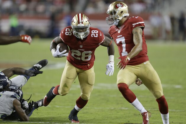 San Francisco 49ers running back Carlos Hyde (28) runs against the Seattle Seahawks during the second half of an NFL football game in Santa Clara, Calif., Thursday, Oct. 22, 2015. (AP Photo/Ben Margot)