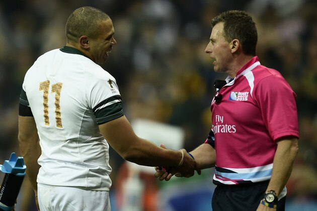 South Africa's wing Bryan Habana (L) speaks with Welsh referee Nigel Owens after winning a Pool B match of the 2015 Rugby World Cup between South Africa and Scotland at St James' Park in Newcastle-upon-Tyne, north east England on October 3, 2015.
AFP PHOTO / LIONEL BONAVENTURE
RESTRICTED TO EDITORIAL USE, NO USE IN LIVE MATCH TRACKING SERVICES, TO BE USED AS NON-SEQUENTIAL STILLS        (Photo credit should read LIONEL BONAVENTURE/AFP/Getty Images)