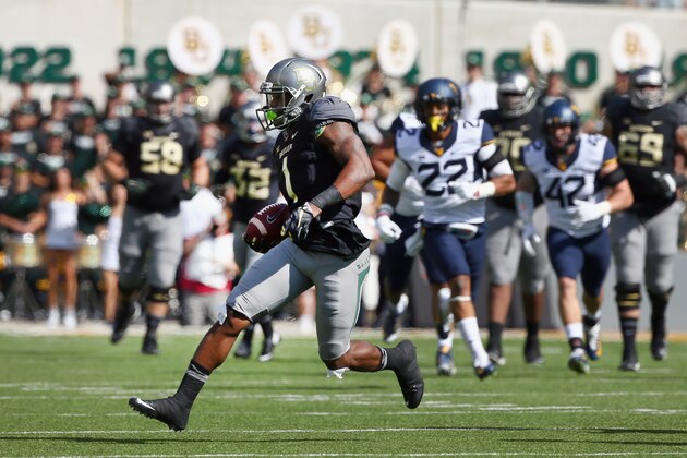 WACO, TX - OCTOBER 17:  Corey Coleman #1 of the Baylor Bears carries the ball against the West Virginia Mountaineers in the first quarter at McLane Stadium on October 17, 2015 in Waco, Texas.  (Photo by Tom Pennington/Getty Images)