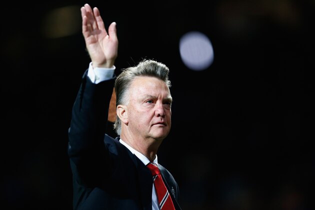 MANCHESTER, ENGLAND - SEPTEMBER 30:  Louis van Gaal manager of Manchester United salutes the crowd after victory in the UEFA Champions League Group B match between Manchester United FC and VfL Wolfsburg at Old Trafford on September 30, 2015 in Manchester, United Kingdom.  (Photo by Dean Mouhtaropoulos/Getty Images)