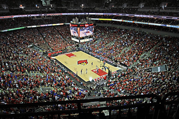 More than 22,800 fans packed the KFC Yum! Center for the Kentucky vs. Louisville NCAA college basketball game in Louisville, Ky., Saturday, Dec. 27, 2014. No. 1 Kentucky beat No. 4 Louisville 58-50 to remain unbeaten. (AP Photo/Garry Jones)