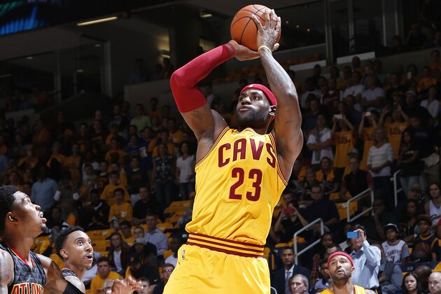CINCINNATI, OH - OCTOBER 7: LeBron James #23 of the Cleveland Cavaliers takes a shot against the Atlanta Hawks during a preseason game at Cintas Center on October 7, 2015 in Cincinnati, Ohio. The Hawks defeated the Cavaliers 98-96. NOTE TO USER: User expressly acknowledges and agrees that, by downloading and or using the photograph, User is consenting to the terms and conditions of the Getty Images License Agreement. (Photo by Joe Robbins/Getty Images)