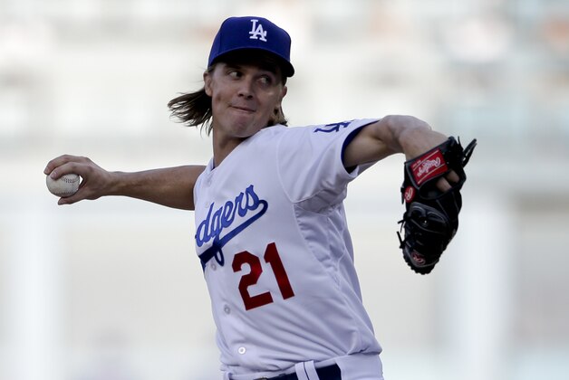 Los Angeles Dodgers starting pitcher Zack Greinke works against a New York Mets batter during the first inning in Game 5 of baseball's National League Division Series Thursday, Oct. 15, 2015, in Los Angeles. (AP Photo/Gregory Bull)