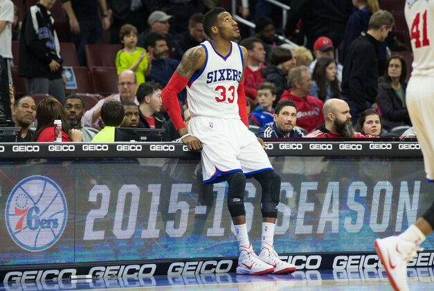 Apr 8, 2015; Philadelphia, PA, USA; Philadelphia 76ers forward Robert Covington (33) leans on the scorers table during the second half of a game against the Washington Wizards at Wells Fargo Center. The Wizards won 119-90. Mandatory Credit: Bill Streicher-USA TODAY Sports