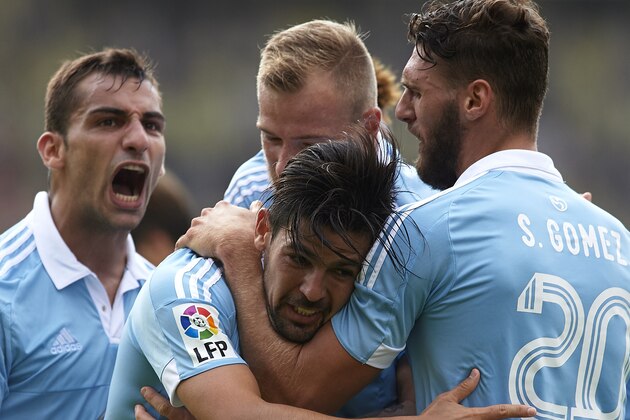 VILLARREAL, SPAIN - OCTOBER 18:  Nolito of Celta celebrates scoring his team's second goal with his teammates Sergi Gomez, John Guidetti and Jonathan Castro (L) during the La Liga match between Villarreal CF and RC Celta de Vigo at El Madrigal Stadium on October 18, 2015 in Villarreal, Spain.  (Photo by Manuel Queimadelos Alonso/Getty Images)