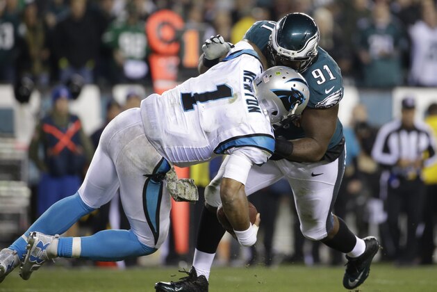 Philadelphia Eagles' Fletcher Cox (91) sacks Carolina Panthers' Cam Newton (1) during the second half of an NFL football game, Monday, Nov. 10, 2014, in Philadelphia. (AP Photo/Matt Rourke)