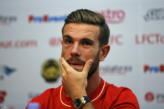 Liverpool football player Jordan Henderson gestures during a press match press conference at a hotel in Kuala Lumpur, Malaysia, on Wednesday, July 22, 2015. Liverpool will play an exhibition match against the Malaysia XI team at Bukit Jalil National stadium on July 24. (AP Photo/Vincent Thian)