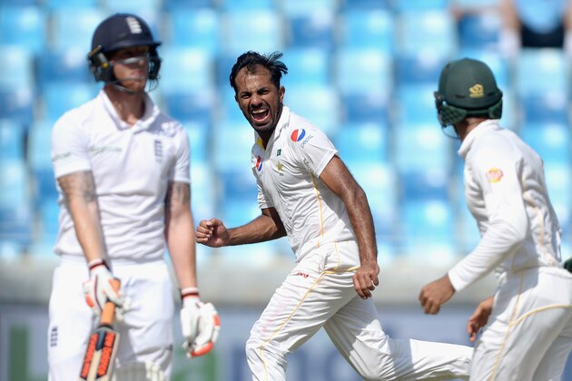 DUBAI, UNITED ARAB EMIRATES - OCTOBER 24:  Wahab Riaz of Pakistan celebrates dismissing Ben Stokes of England during day three of the 2nd test match between Pakistan and England at Dubai Cricket Stadium on October 24, 2015 in Dubai, United Arab Emirates.  (Photo by Gareth Copley/Getty Images)
