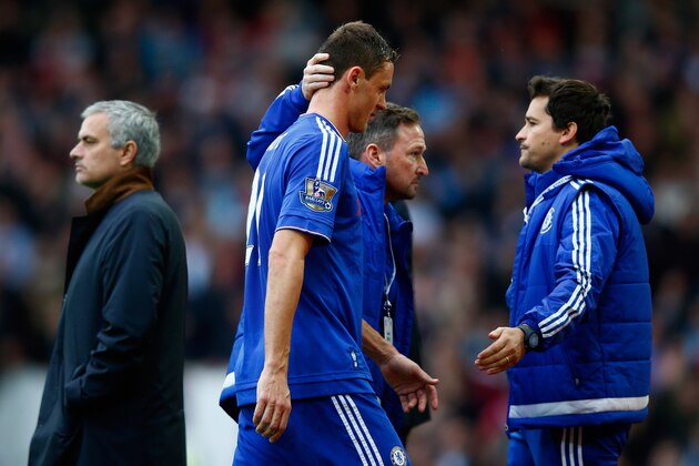 LONDON, ENGLAND - OCTOBER 24:  Nemanja Matic (2nd L) of Chelsea walks past Manager Jose Mourinho (1st L) after being shown a red card during the Barclays Premier League match between West Ham United and Chelsea at Boleyn Ground on October 24, 2015 in London, England.  (Photo by Clive Rose/Getty Images)