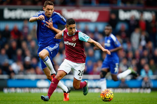 LONDON, ENGLAND - OCTOBER 24:  Manuel Lanzini of West Ham United and Nemanja Matic of Chelsea compete for the ball during the Barclays Premier League match between West Ham United and Chelsea at Boleyn Ground on October 24, 2015 in London, England.  (Photo by Clive Rose/Getty Images)