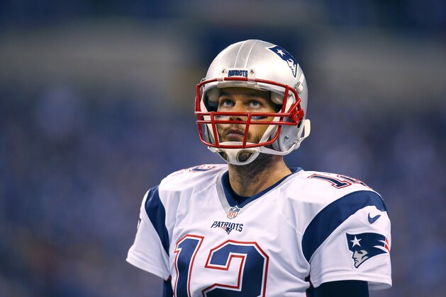 New England Patriots quarterback Tom Brady (12) looks at the scoreboard on the sidelines against the Indianapolis Colts during an NFL football game in Indianapolis, Sunday, Oct. 18, 2015.  (Jeff Haynes/AP Images for Panini)