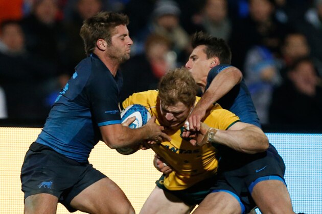 MENDOZA, ARGENTINA - JULY 25: David Pocock of Australia fights for the ball with Tomas Lavanini of Argentina during a match between Australia and Argentina as part of The Rugby Championship 2015 at Estadio Malvinas Argentinas on July 25, 2015 in Mendoza, Argentina. (Photo by Gabriel Rossi/Getty Images)