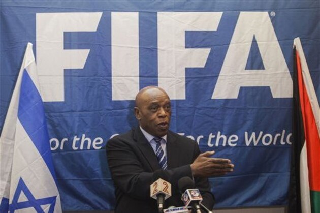 Chairman of the FIFA Monitoring Committee Israel-Palestine, Tokyo Sexwale  speaks to the media during a press conference in Tel Aviv, Israel, Friday, Oct. 2, 2015. Sexwale, who was an anti-apartheid campaigner and former political prisoner on Robben Island, is still deliberating over whether to stand in the FIFA presidential election. “There is a still a deadline ... but we still have some days and I am sure that in the right time I will make an announcement,” Sexwale said in the conference Friday where he headed a meeting on Israeli-Palestinian football relations.  (AP Photo/Dan Balilty)