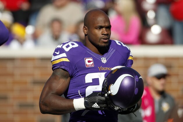 Minnesota Vikings running back Adrian Peterson (28) warms up before an NFL football game against the Kansas City Chiefs, Sunday, Oct. 18, 2015, in Minneapolis. (AP Photo/Ann Heisenfelt)